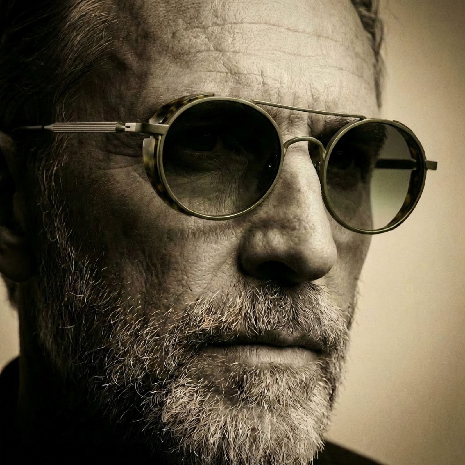 Close portrait of a man wearing Frame Style 2 in low light